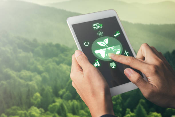 istock hand holing tablet with net zero target and carbon credit on screen.CO2 emission reduction to stop global warming problem and reduce pollution into atmosphere from big industrial. 1575879850