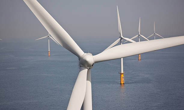 Wind turbine in an offshore park  floating electric generator stock pictures, royalty-free photos & images