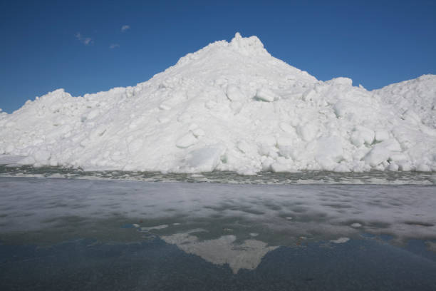 large pancake ice floating on Lake Michigan water