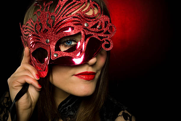 istock Young woman with red mask and lipstick 157588289