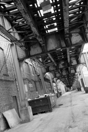 Back alley under an elevated train in Chicago.