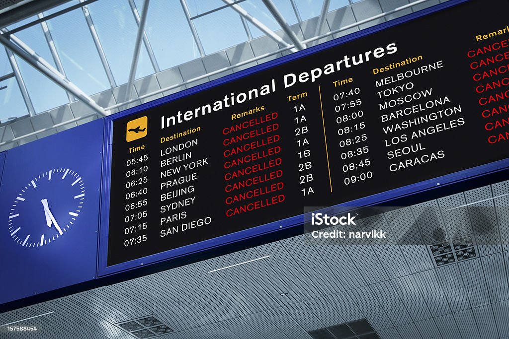 All Flights Cancelled International Departures Information Board with All Flights Cancelled. Photomontage. SEE MY OTHER SIMILAR PHOTOS: Commercial Airplane Stock Photo