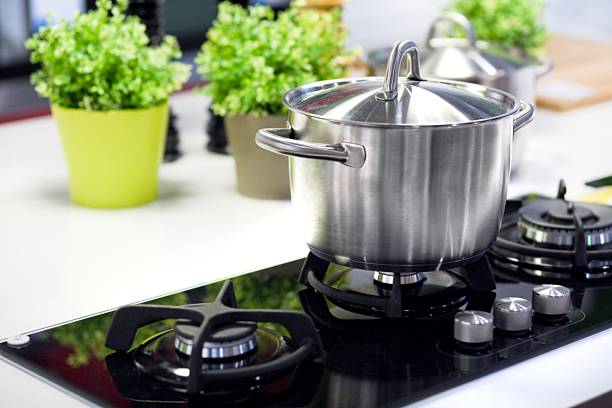Cooking Saucepan on stove - hot burner