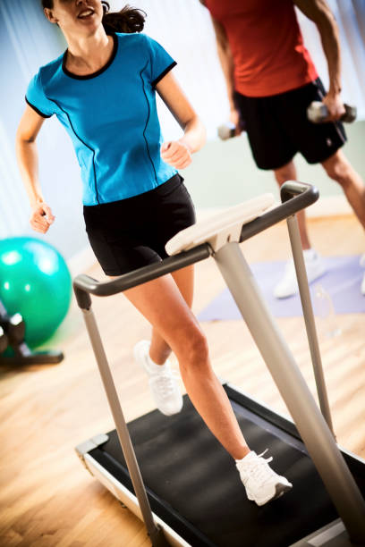 istock Man and Woman Exercising 157588622