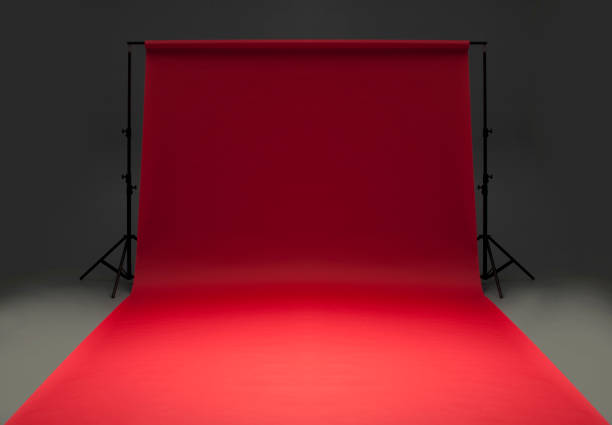 istock Seamless red background paper hanging on stands-isolated on grey 157588635