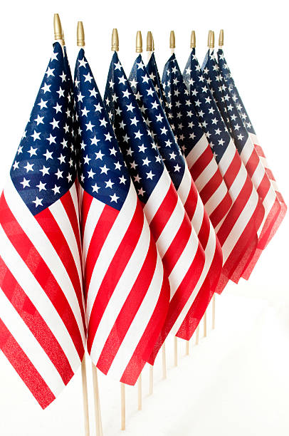 istock Row of American Flags Isolated On White 157588835