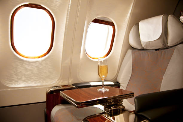 A business class seat on an airplane business class Seat with champagne waiting for a Passenger business journey stock pictures, royalty-free photos & images