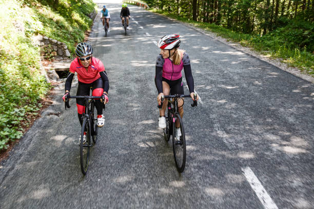 istock Group of friends cycling 1575893044