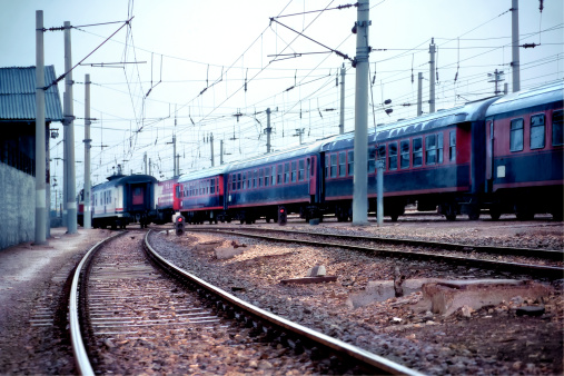 Close up side view of old diesel shunting locomotive with rod drive as concept for ancient technology on railroads