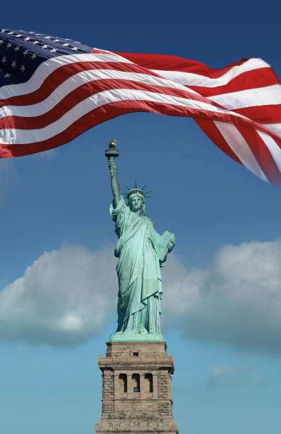 istock Statue of Liberty and US Flag 157589828