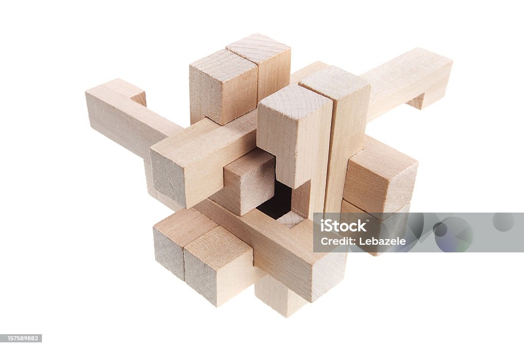 A geometric puzzle made out of wood  Wooden puzzle made of wooden parts. Puzzle Stock Photo