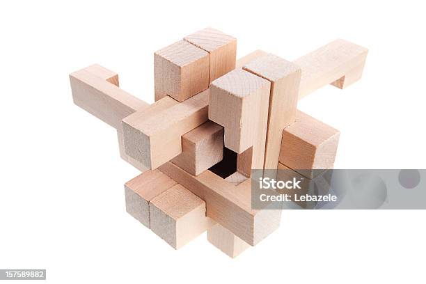 A Geometric Puzzle Made Out Of Wood Stock Photo - Download Image Now - Puzzle, Puzzle Cube, Toy Block
