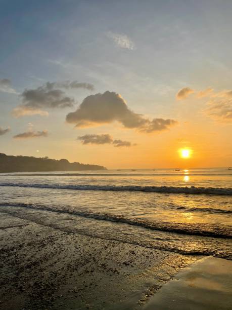 istock Sunset at Jimbaran Beach Bali Indonesia 1575898913