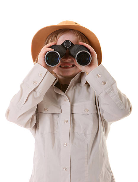 safari girl with binoculars stock photo