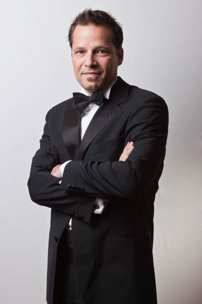 istock Young man in tuxedo with black tie 157589996