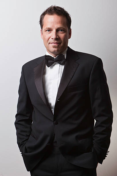 istock Young man in tuxedo with black tie 157590018