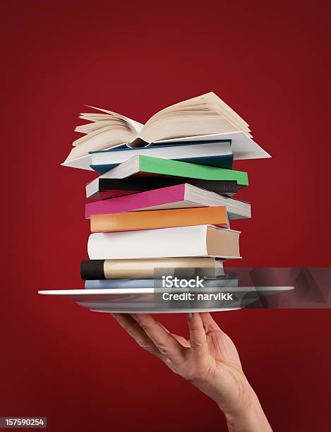 Pile Of Books On The Plate Stock Photo - Download Image Now - Book, Giving, Stack