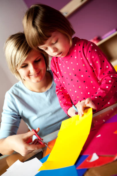 istock Mother teaching her little girl in creativity 157590310