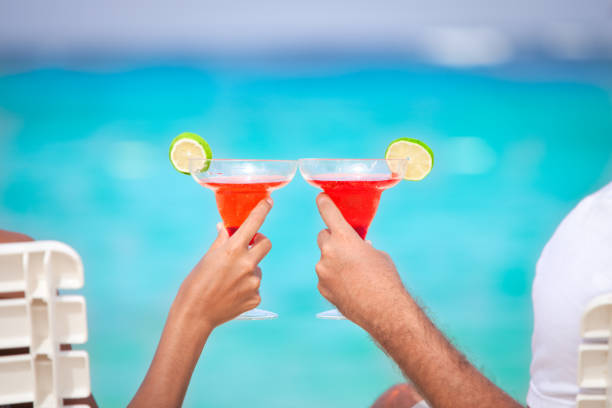 istock Couple toasting on a Tropical turquoise beach 157590626