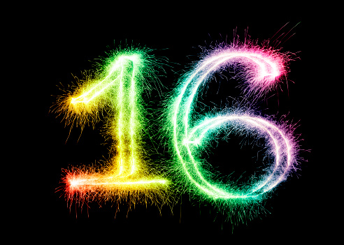 Sparkling multi colored number 16 on a pure black background. Can be used for birthdays, anniversaries.