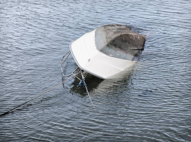 capsized лодке утопать - fishing boat стоковые фото и изображения