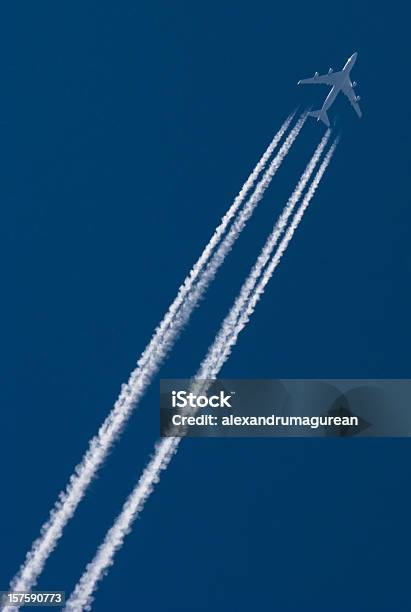 Airplane Leaving Contrail Stock Photo - Download Image Now - Airplane, Blue, Color Image