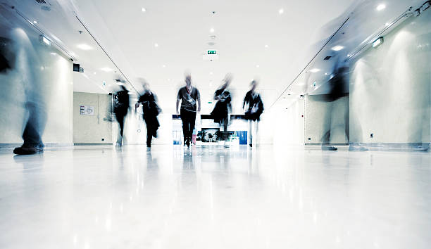 istock People in motion indoors 157590984