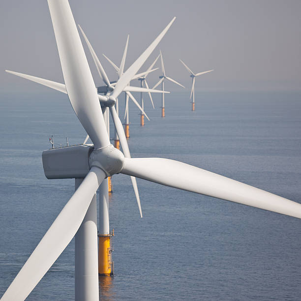 Wind turbines in an offshore park stock photo