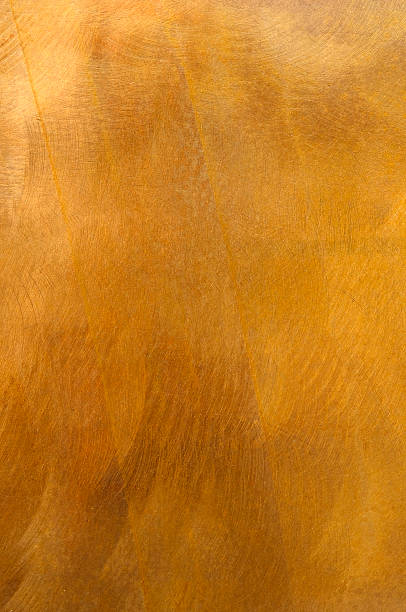 istock Golden metal plate mottled brass background XL 157591130