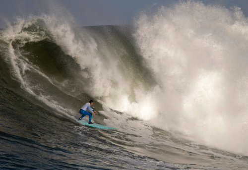 Surfing a Huge Wave