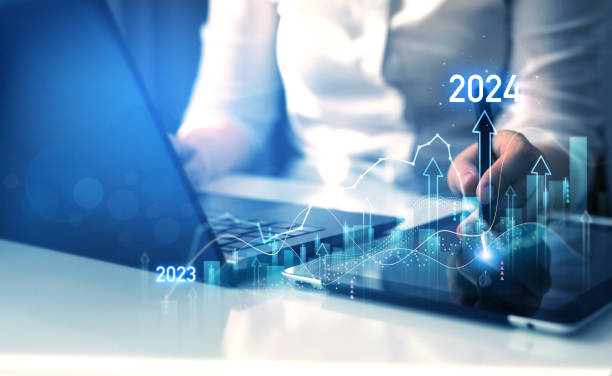 istock Increase business arrow graph corporate future growth year 2023 to 2024. Development to success and motivation. Year 2024 plan, action and goals. 1575924710