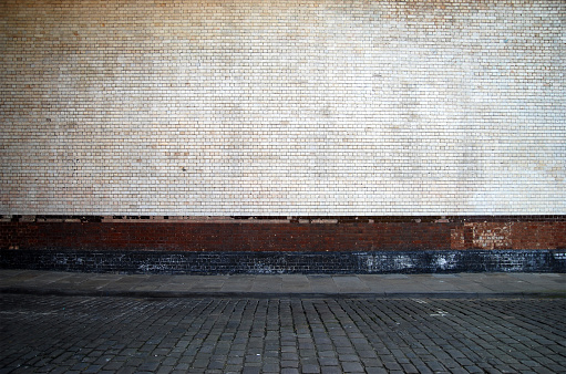 Wall and sidewalk