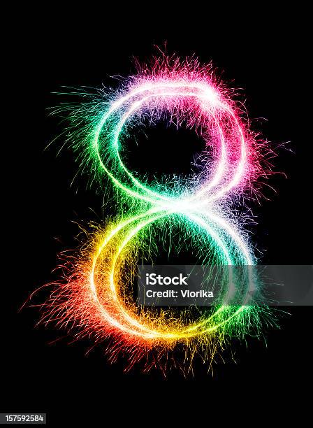 A Sparkler Forming The Number 8 In A Rainbow Color Stock Photo - Download Image Now - Number 8, Anniversary, Black Background