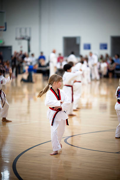 Black Belt Testing Young girl at Tae Kwon Do black belt testing. mm1 stock pictures, royalty-free photos & images