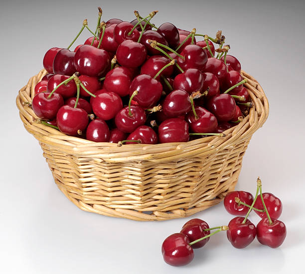 A basket full of sweet red cherries