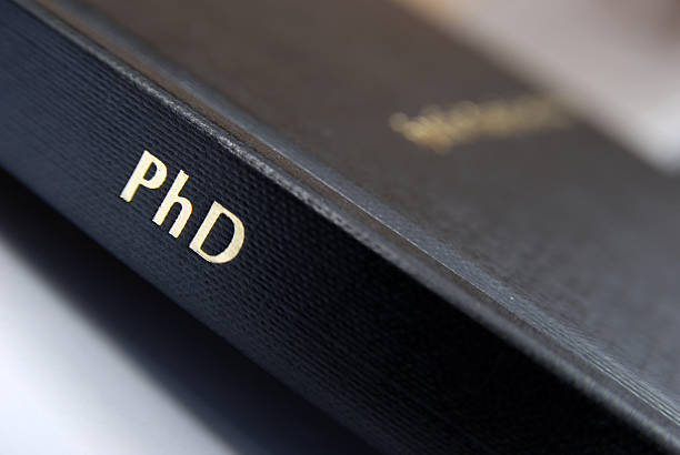 Phd thesis hardbound cover macro Phd thesis hardbound cover macro dissertation photos stock pictures, royalty-free photos & images