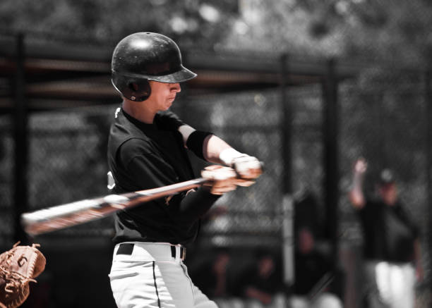 istock Teen Baseball Player Batting 157593021