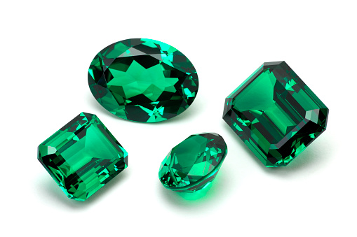 Emerald, sapphire and ruby rings jewelry with precious gems. 3D illustration