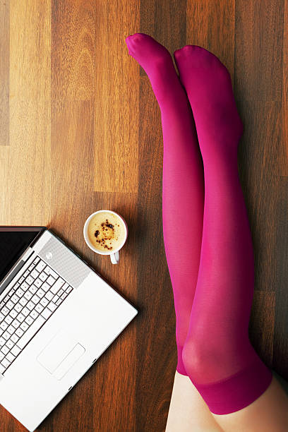 istock coffee, laptop and pink socks 157593212