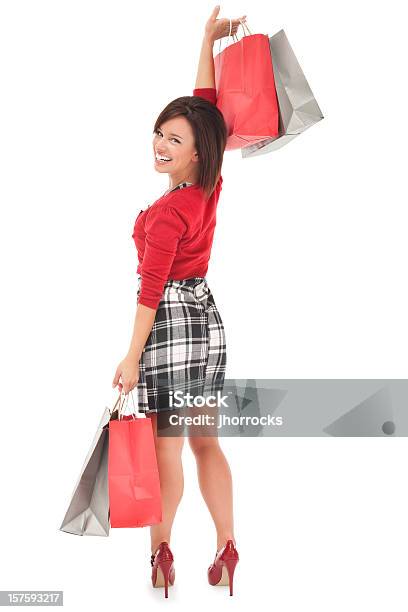 Photo libre de droit de Belle Jeune Femme Avec Des Sacs banque d'images et plus d'images libres de droit de Cadrage en pied - Cadrage en pied, Commerce, Faire les courses