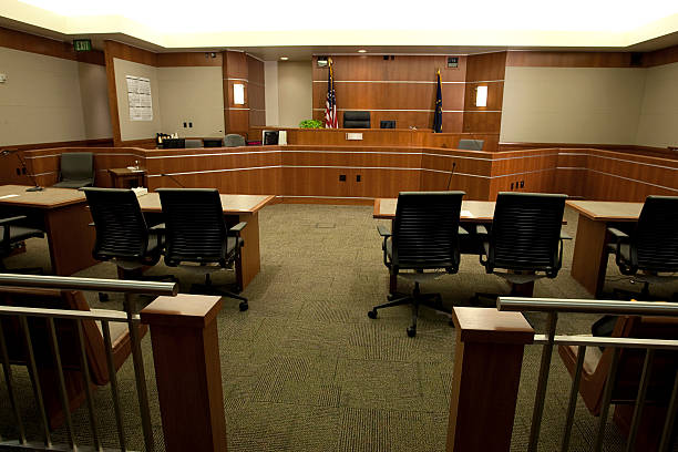 Modern Courtroom Wide Angle from Gallery's Point-of-View Royalty free image showing a wide angle view of a modern courtroom setting from the gallery's point-of-view.  For more images of courtrooms as well as images featuring law and justice themes, click on these thumbnails: legal trial stock pictures, royalty-free photos & images