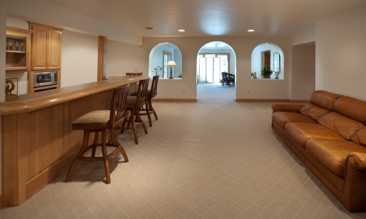 Large Finished Carpeted Luxury Basement With Bar