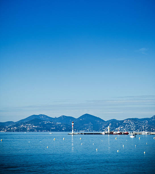 Nice Harbour with the Phare de Nice (Nice Lighthouse) at the end of the harbour wall. April 25th, 2011.