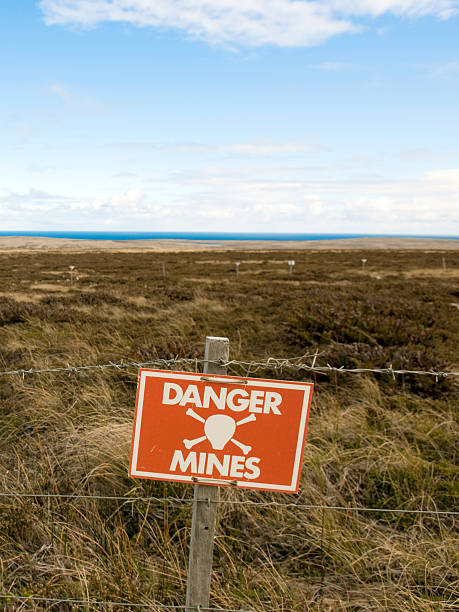 Danger Minefield with warning sign  land mine stock pictures, royalty-free photos & images