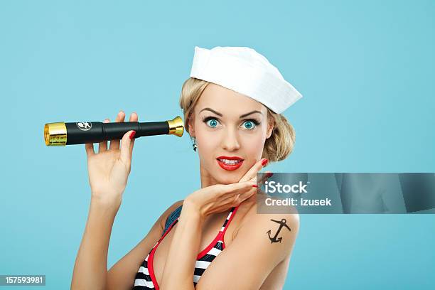 Pinup Style Sailor Woman Holding Telescope Stock Photo - Download Image Now - Sailor, Tattoo, Women