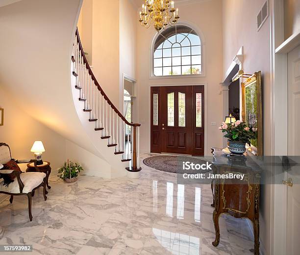 Grand Foyer Staircase Chandelier Marble Floor Showcase Home Interior Design Stock Photo - Download Image Now