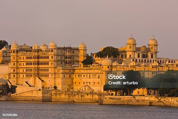 Golden Udaipur City Palace Stock Photo - Download Image Now - Udaipur, Lake, Sunset