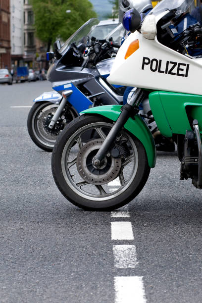 istock Two german police motorcycles - side view 157594199