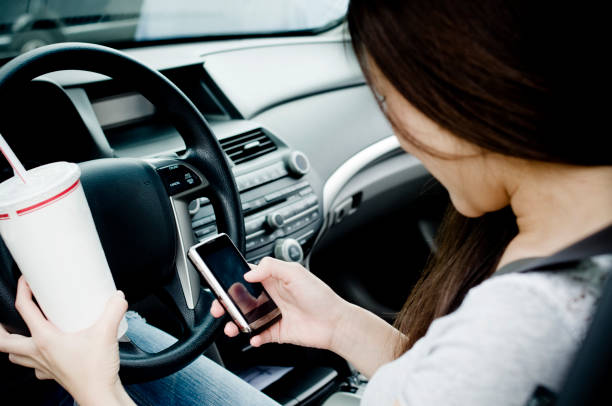 istock Teen driver texting and driving 157594266