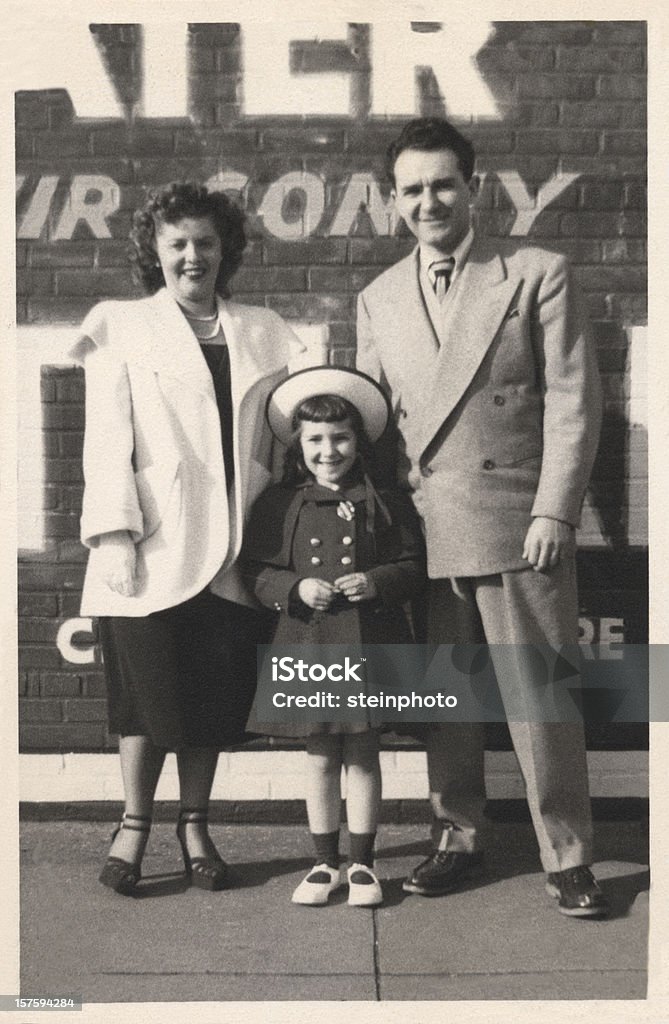 Vintage Family Snapshot Mom, dad, and daughter. Family portrait circa 1946,  Brooklyn, New York. Retro Style Stock Photo